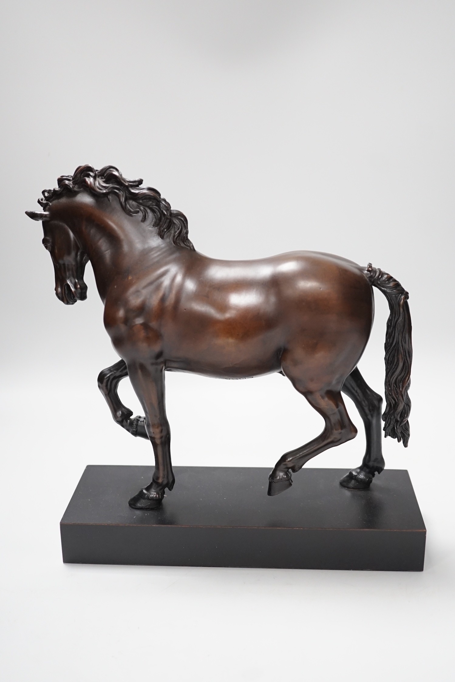A reproduction bronzed figure of a horse, together with a column desk lamp, 53cm tall excl. light fighting